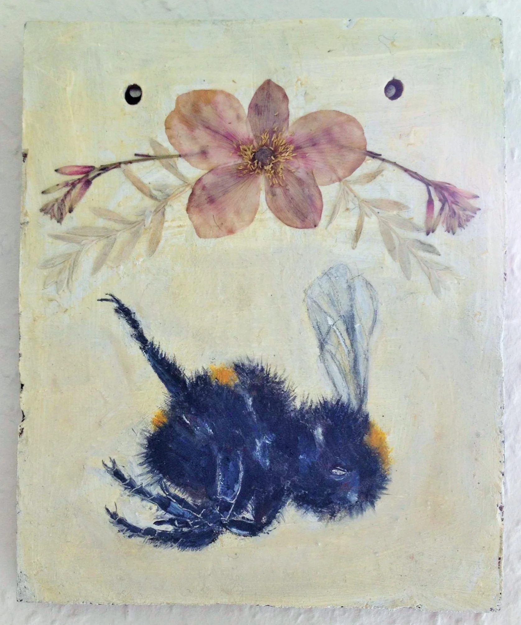 Terracotta tile shrine for a bee, with pressed flowers