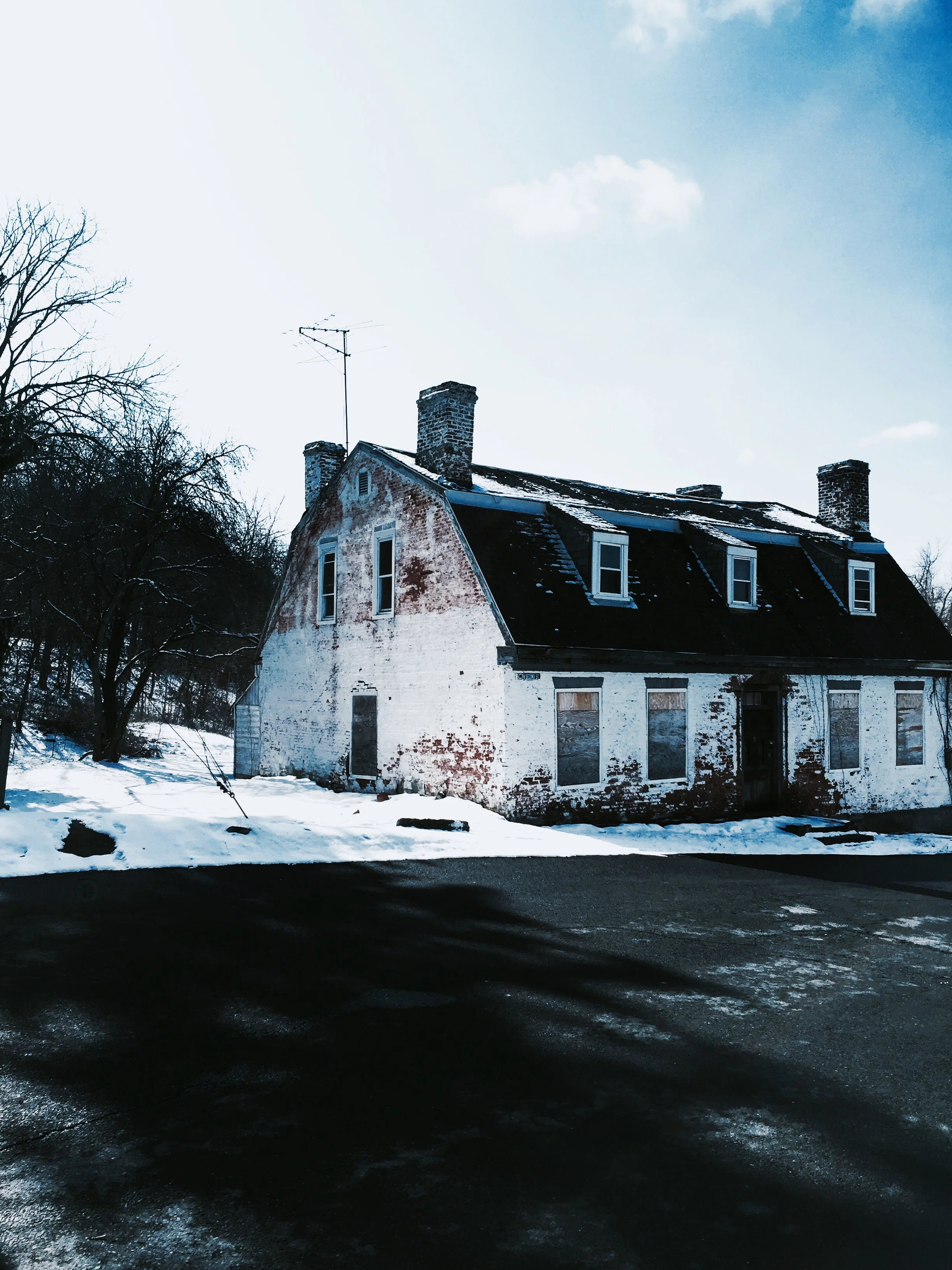 Boarded up house with uber charm