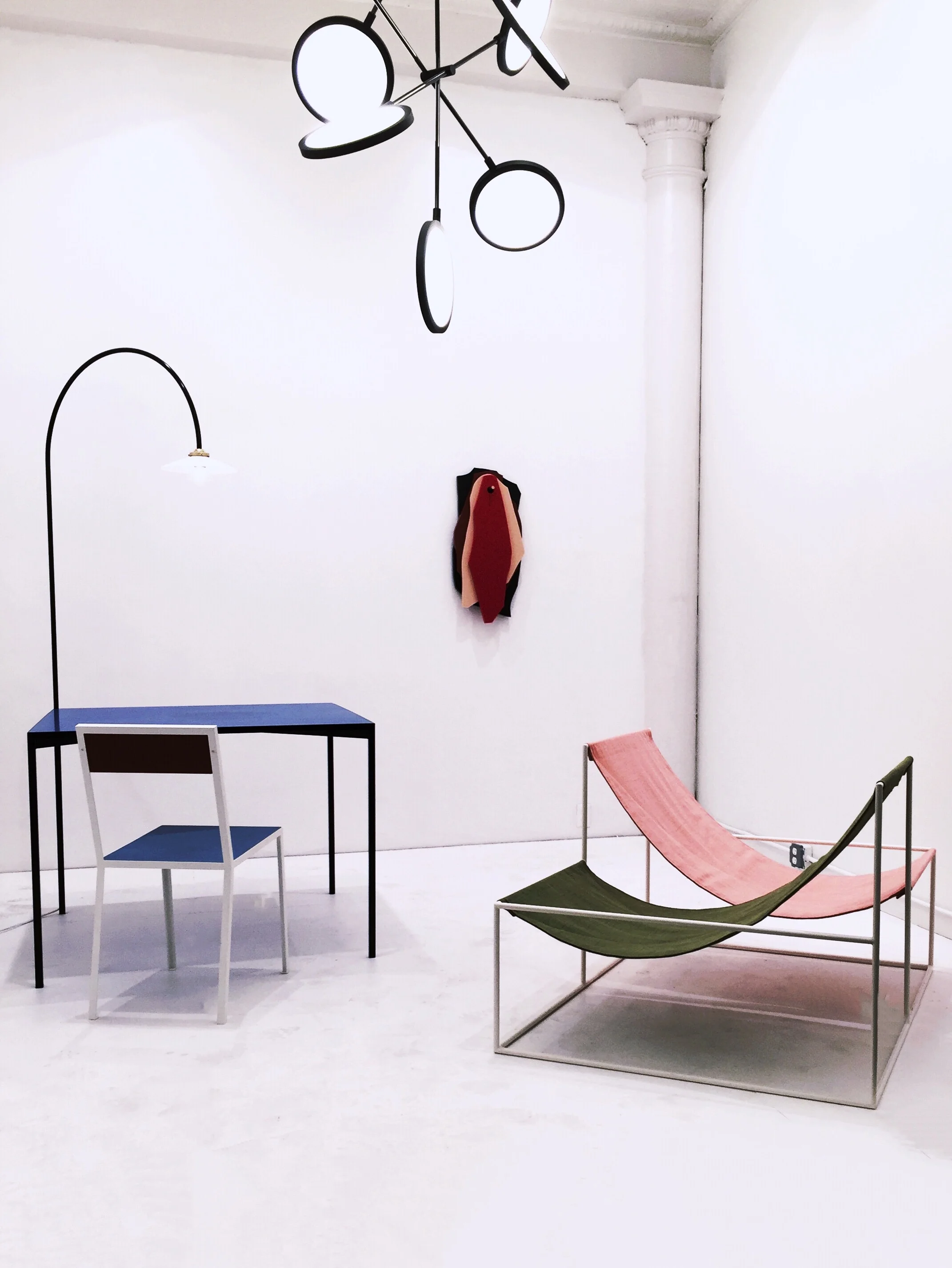 table and lamp, first chair and duo seat