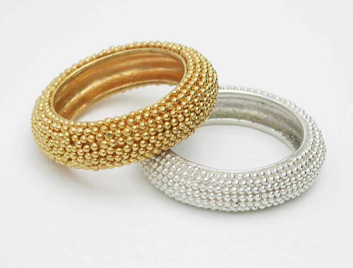Silver and gold rings