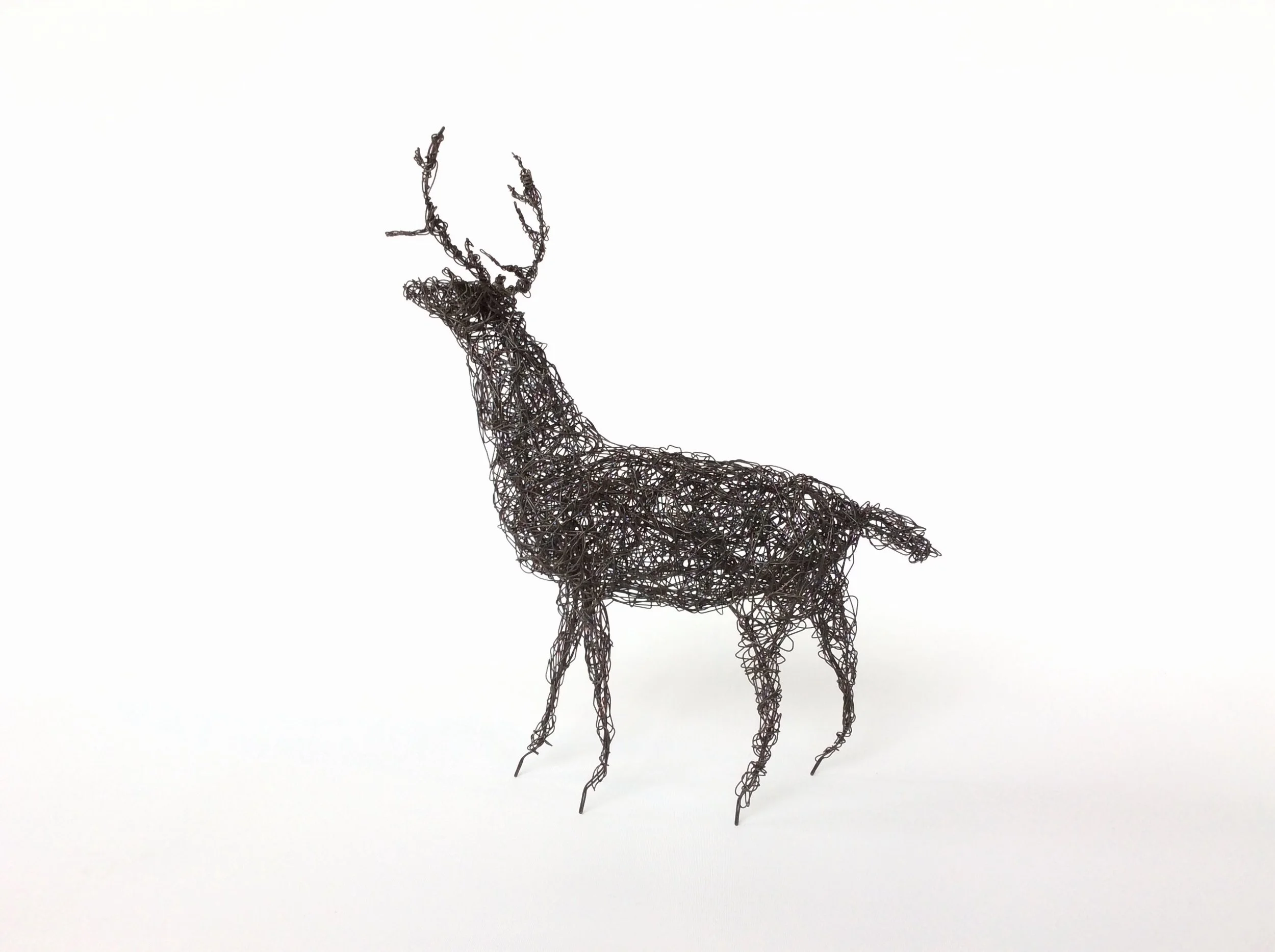Reaching Black Wire Stag
