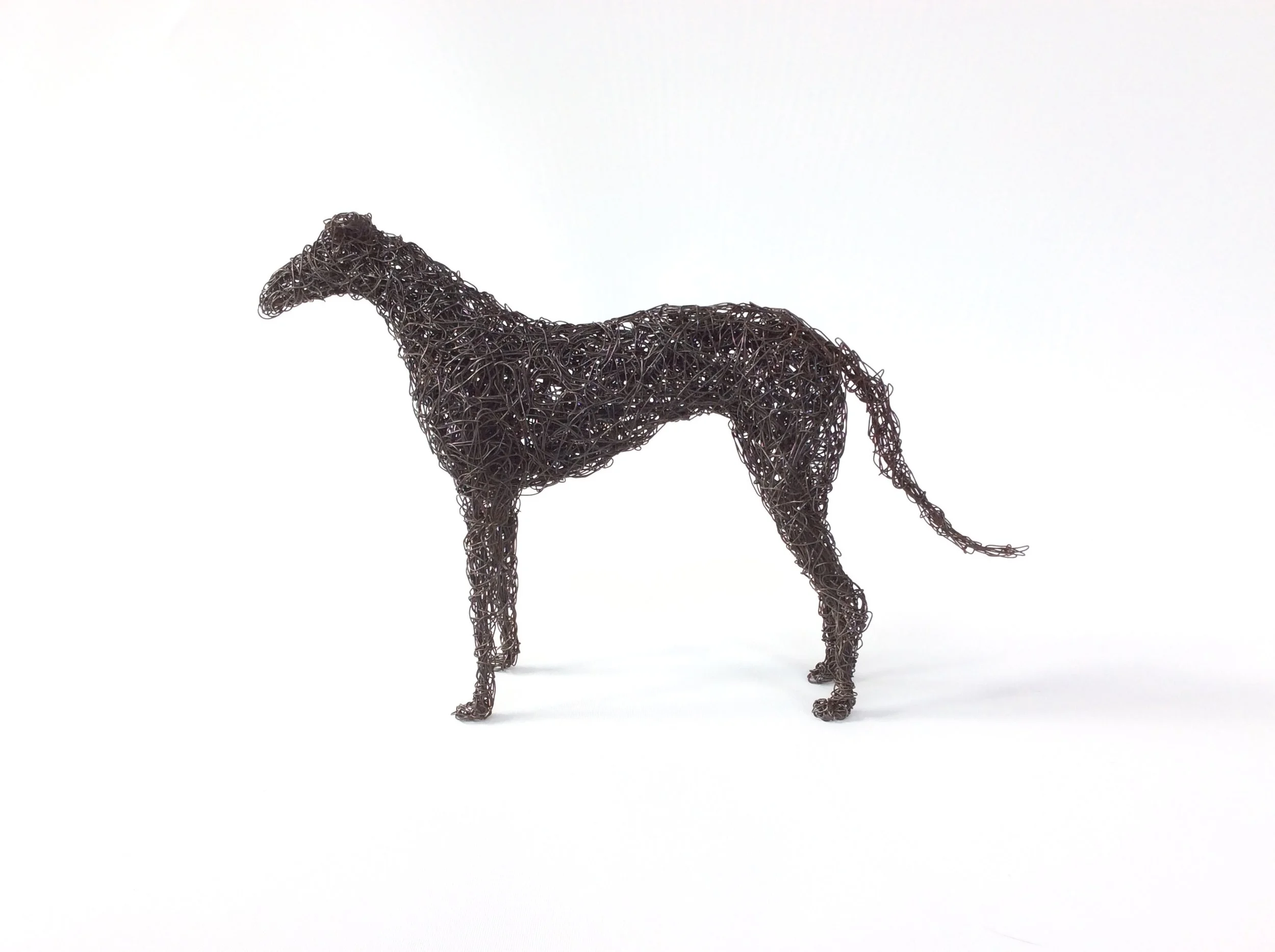 Black Wire Trotting Dog