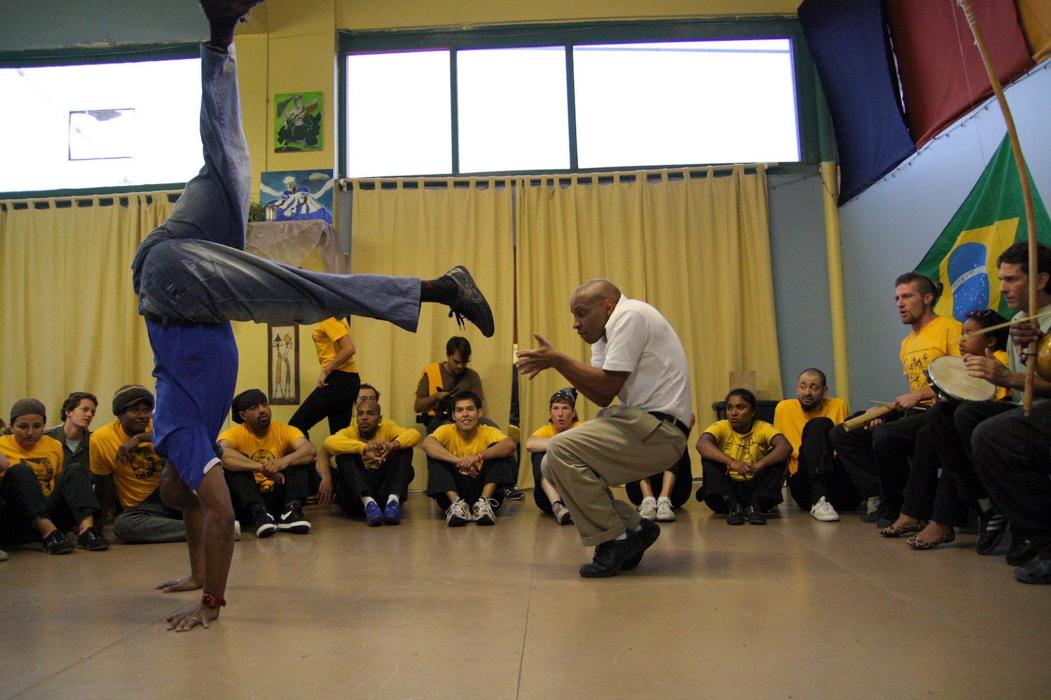 Silvio dos Reis and student in a Capoeira game, Seattle, WA.