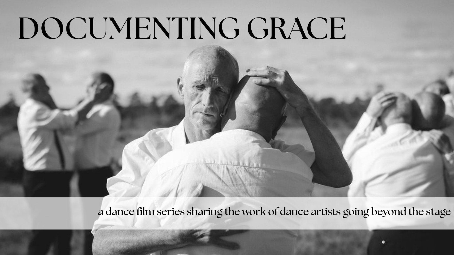 elderly men embracing