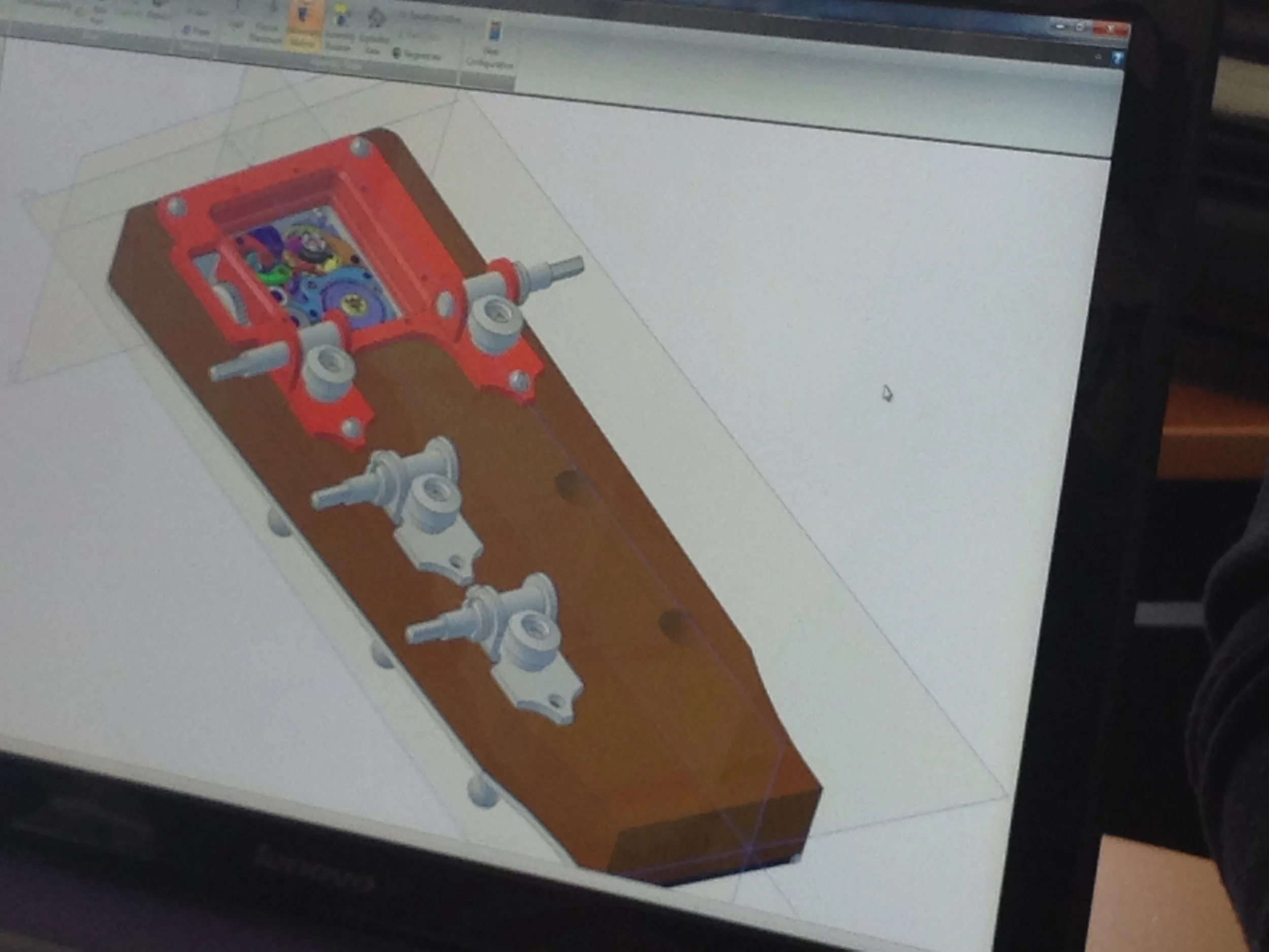  Modeling of the head stock to accommodate a working timepiece and specially manufactured tuning machines to achieve material singularity for the case and crown-theme tuners. 