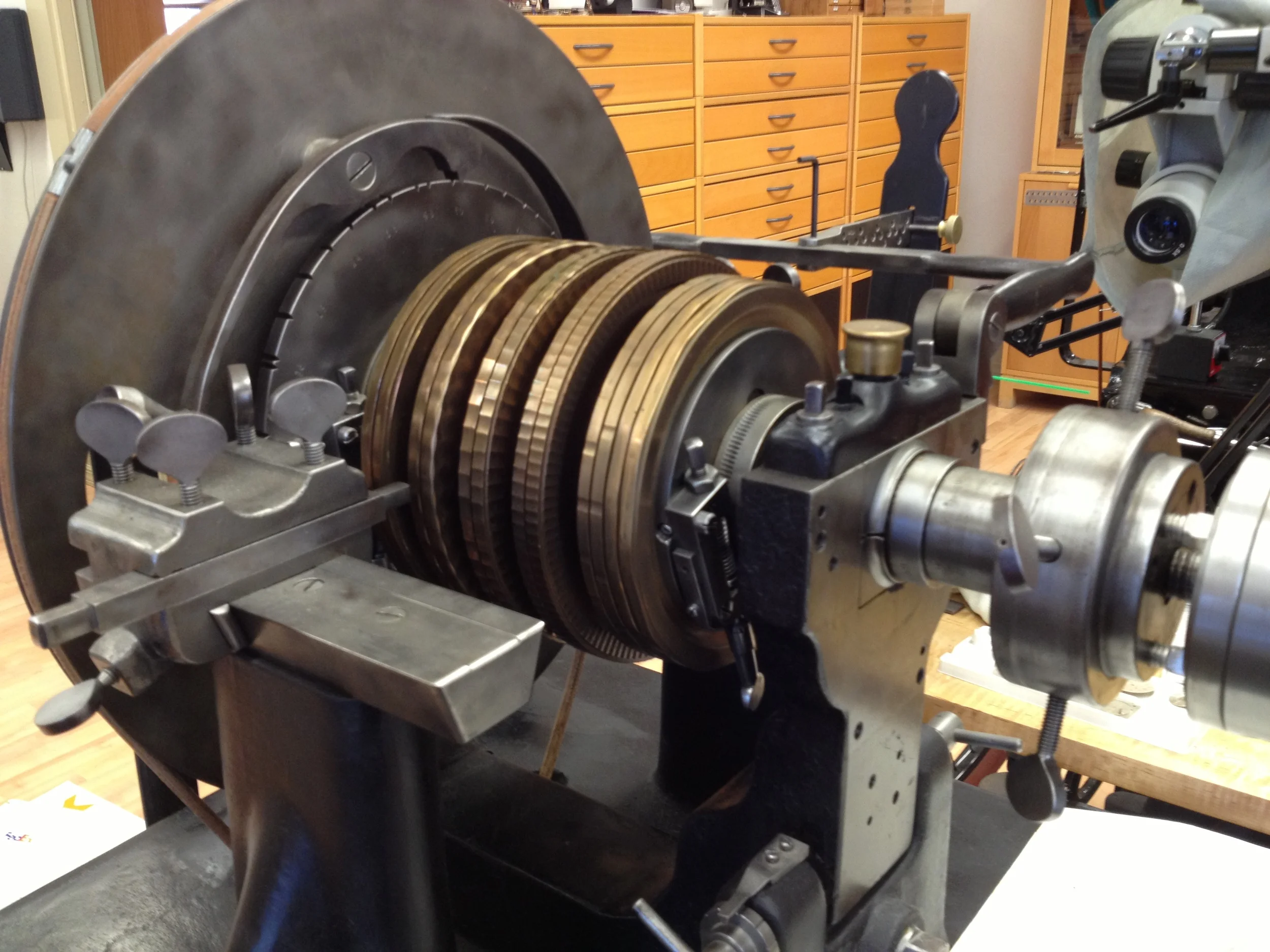  One of the many ancient machines employed by RGM Watches to create the unique appointments found among the guitar inlay pieces and the watch movement. 