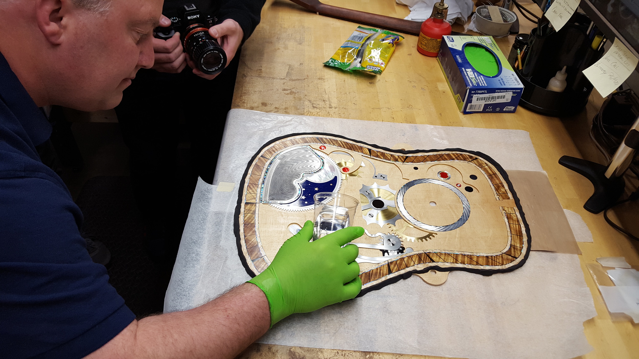 Beginning to flow construction resin across the top assembly. Steady hands required.