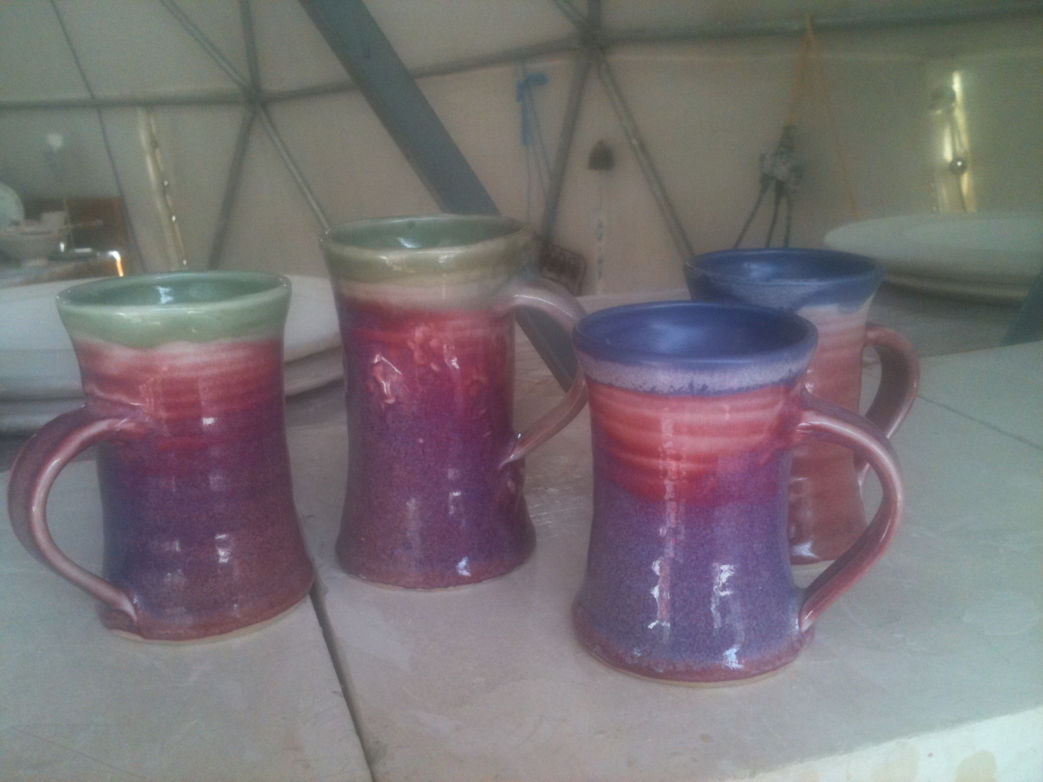 Set of copper red mugs