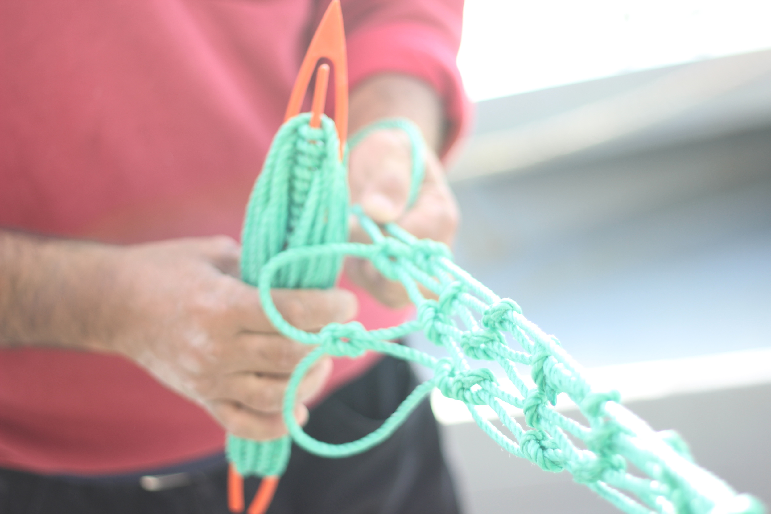 Mending net. Captain Osman Korkmaz’s boat on the Bosphorus Strait   --   Istanbul, Turkey
