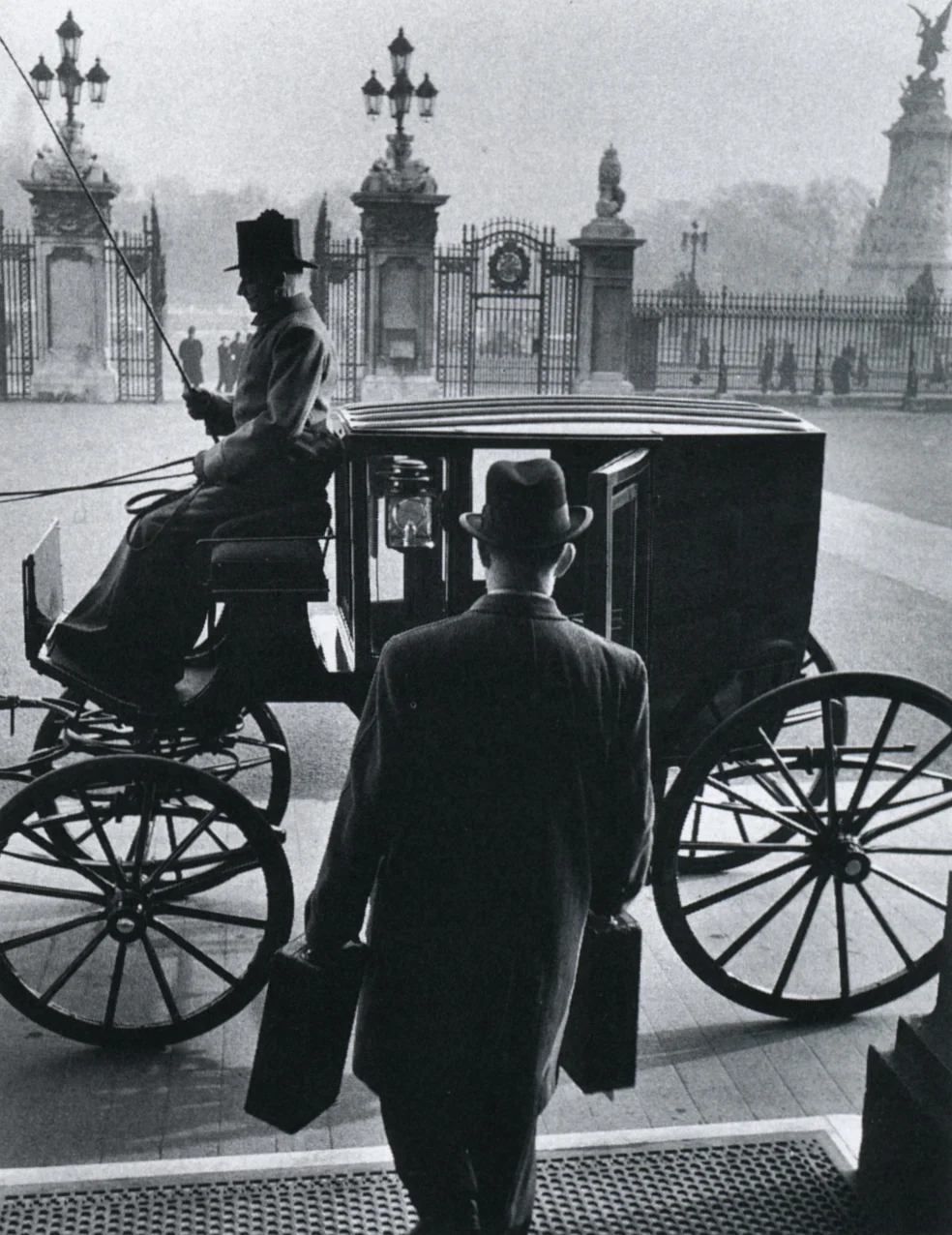liquidnight:

Carl Mydans
The Queen’s Messenger leaves Buckingham Palace with dispatches for the Foreign Office, circa 1950s
From Carl Mydans: Photojournalist