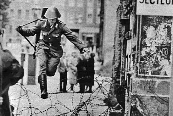 fuckyeahhistorycrushes:

samrandom submitted:
Conrad Schumann
The most  famous of these escapes was made by 19-year-old guard Conrad Schumann on  August 15, 1961—50 years ago today—just the third day of the wall’s  construction. Since the “wall” was…