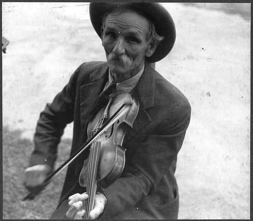 that moustache screams “FOLK” even more than the fiddle does.
curliestofcrowns:

my-ear-trumpet:

fourchirps:

Old-Timey Tunes
The University of North Carolina Library is streaming their Southern Folklife Collection. So put that mouse do…