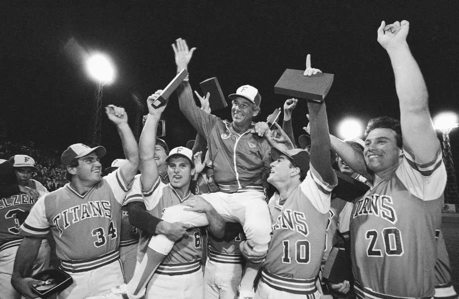 Chanps - Coach on Players Shoulders.jpg