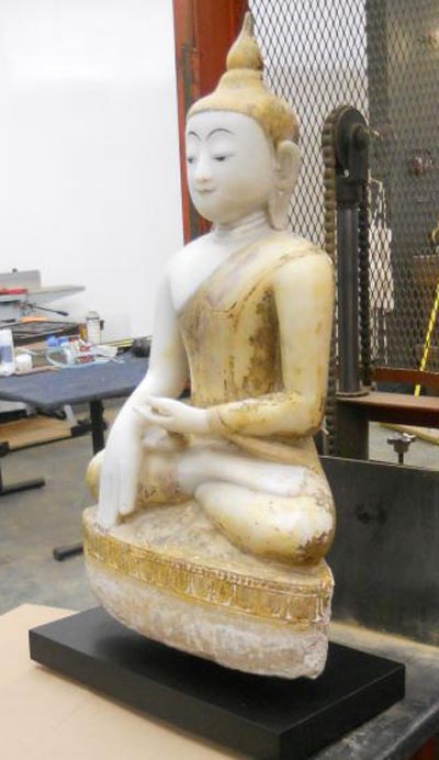 says you would not believe how heavy this antique Alabaster Buddha is. It is a good thing I have the forklift-1..jpg