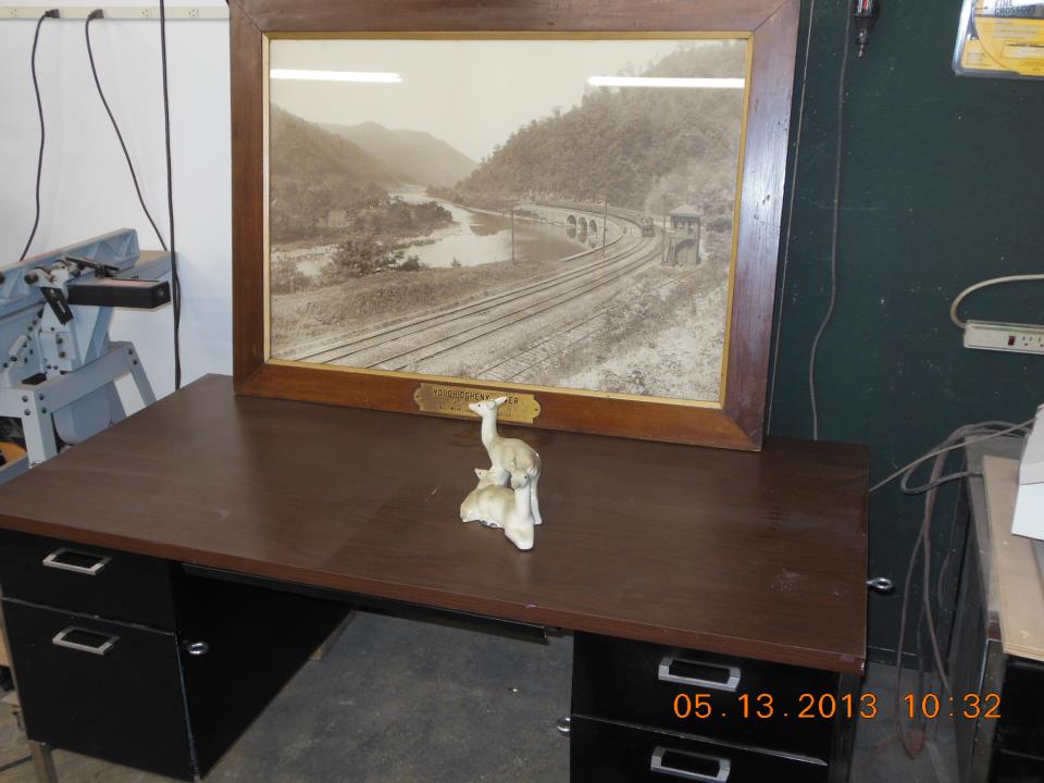 very cool large format photograph of the Ohio and Baltimore Railroad and frame circa 1900 and a less interesting ceramic deer in the workshop today for restoration. The deer has a chip in the ear.jpg