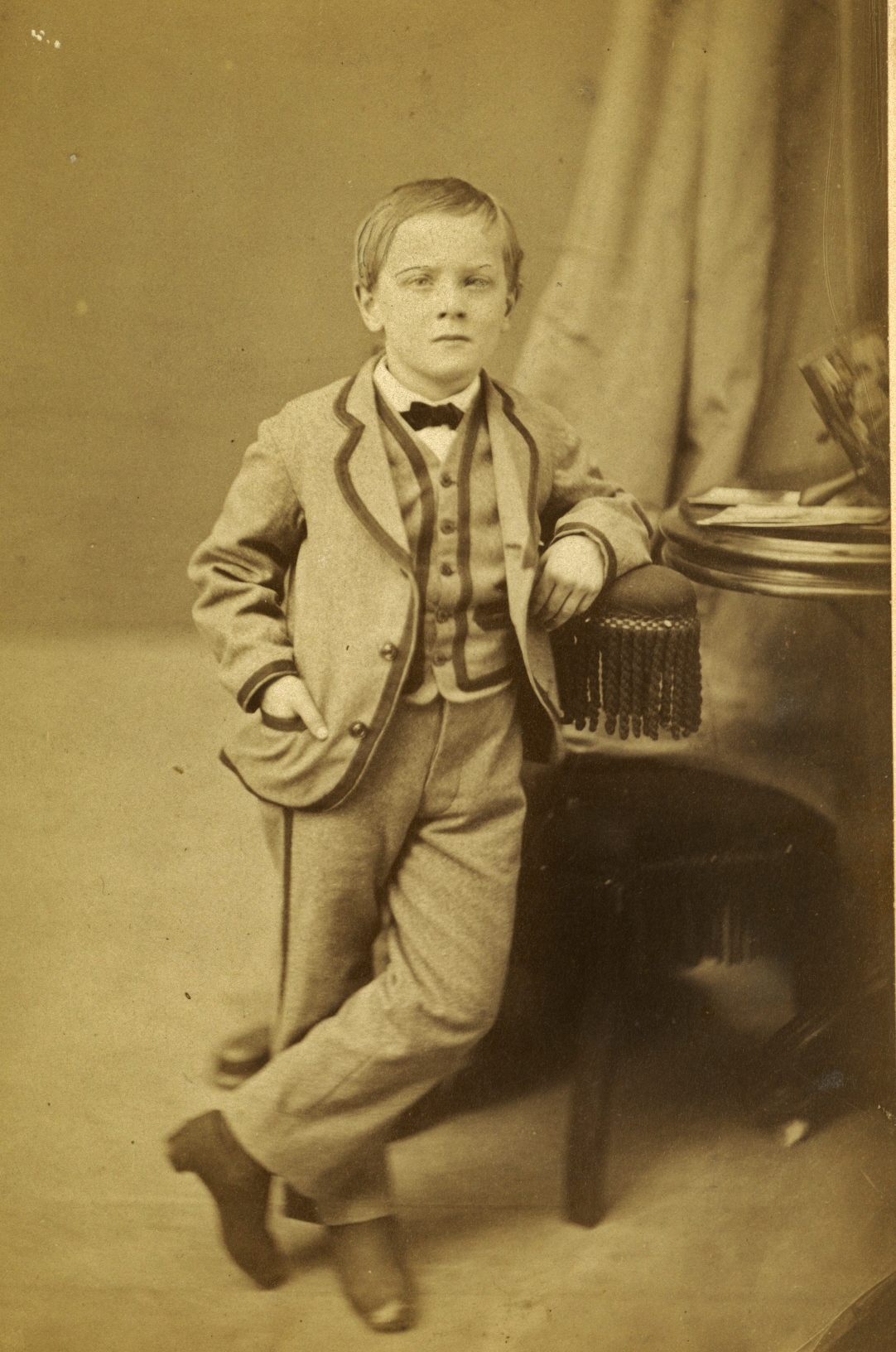 Style of child's suit sold at Pearce & Marett's
