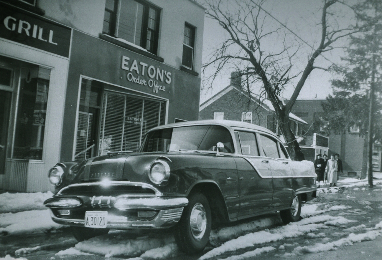1964Balvers Grill and the Eaton's Order Office George Mantle's car ,,,cherry red and cream 