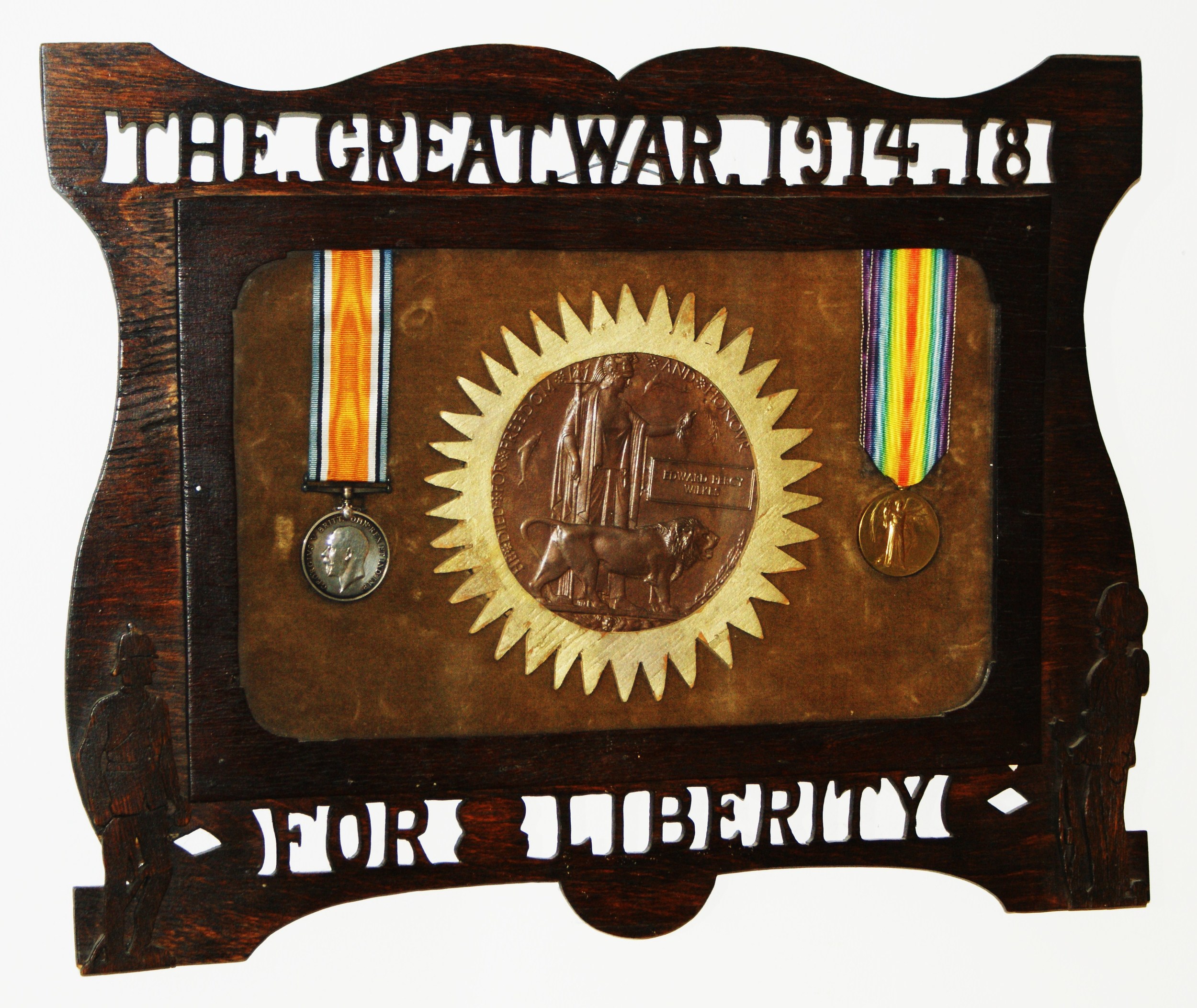 War -Memorial frame of deceased soldier with medals and coffin medallion