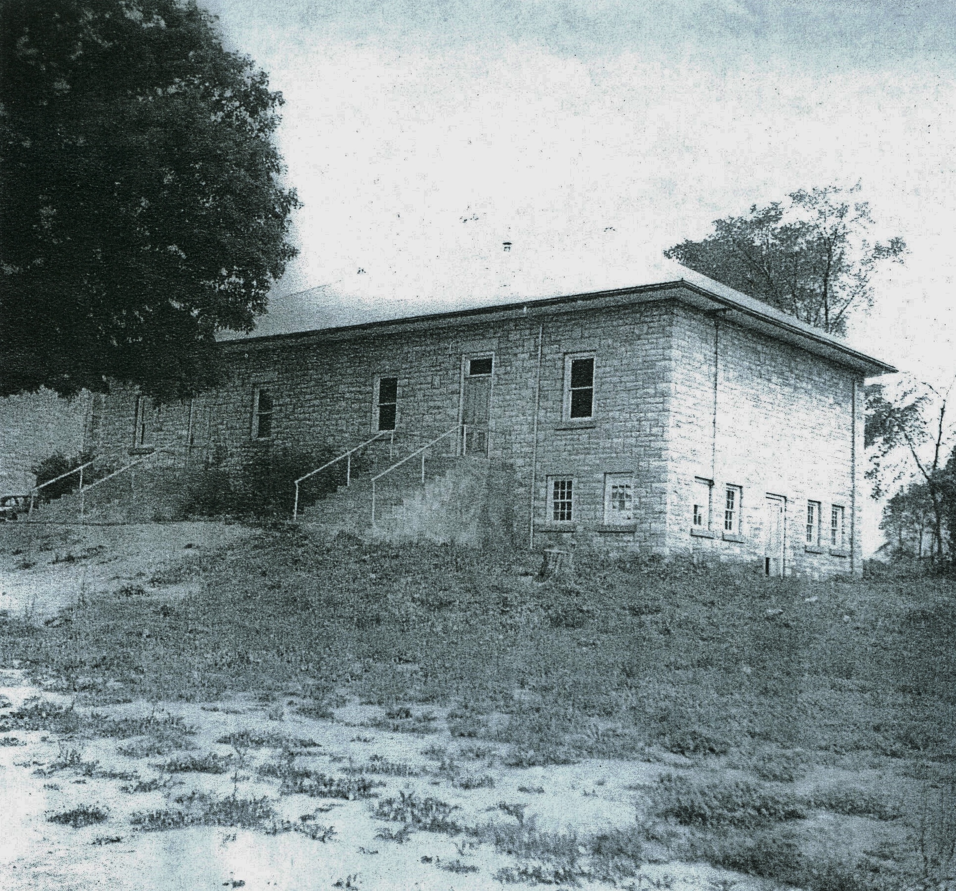Two Room school house with basement for storage and old two seater toilets, built in 1922