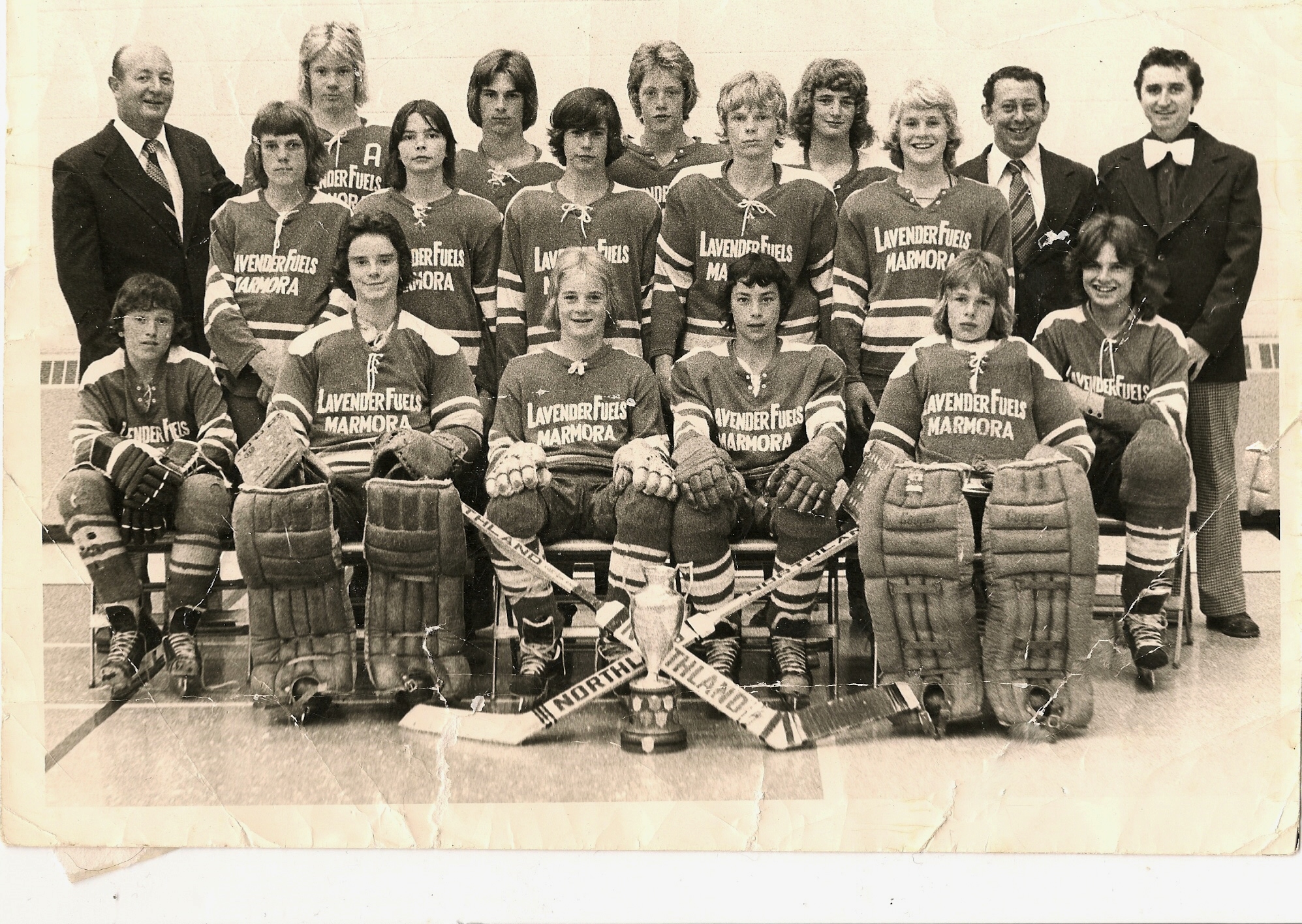 Back row: (L-R) Tom Hanley, Mark Hanley Kelly Welch, Justin Hanley, Greg Terrion, Bob Bartch, Wilfred Terrion Middle Row: (L-R): Andy Johnson, Jamie Lajoie, Paul Bicknell, Gord Wisti, Jamie Mantle, Tim Black (seated) Front Row: (L-R): Pooie Doyle(seated), Dave Lunau, Terry Terrion, Rick Nesseth, Rick Lynch