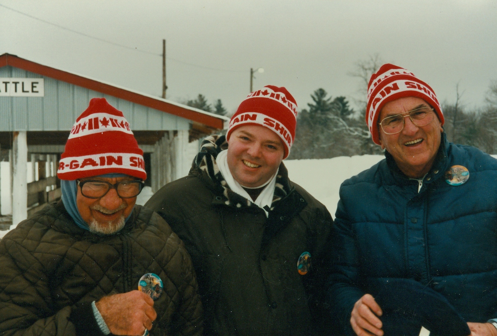 Tom Bedore and Leo Auger with a Snofest Sales rep between them