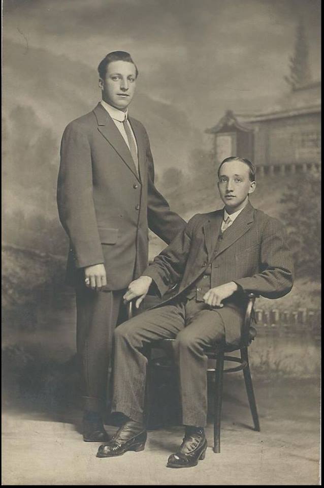 Frank Sweet sitting and Jack Sampson standing.
