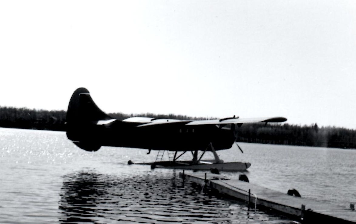 Otter aircraft loaded with fish, Cordova Lake. c.1969