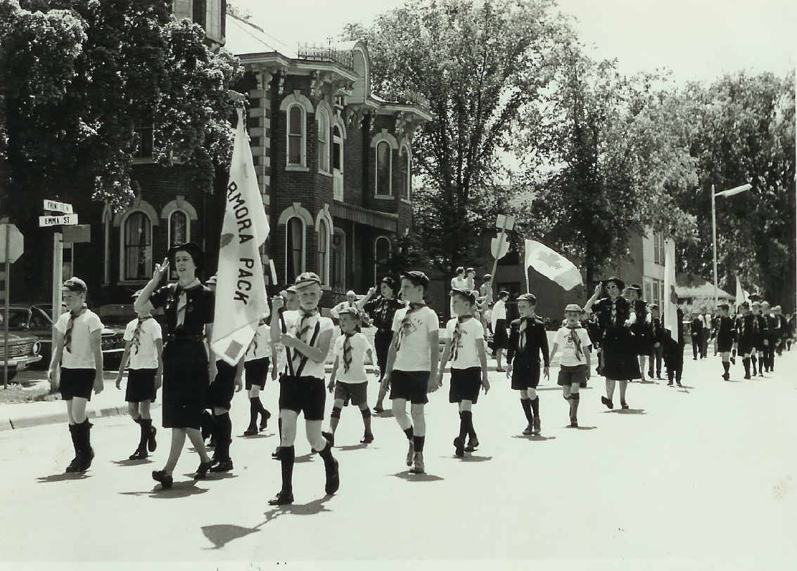 A scout march in STirling - June 1965 Doris VanVolkenburg in the lead, Audrey Nichol on the left half-way back. At the back of that group is Jackie Donaldson. In front of her? Other possible leaders back then were Ina March and Lucille Bedore and Della Wilson. Some older Marmora residents might recognize some of the kids.