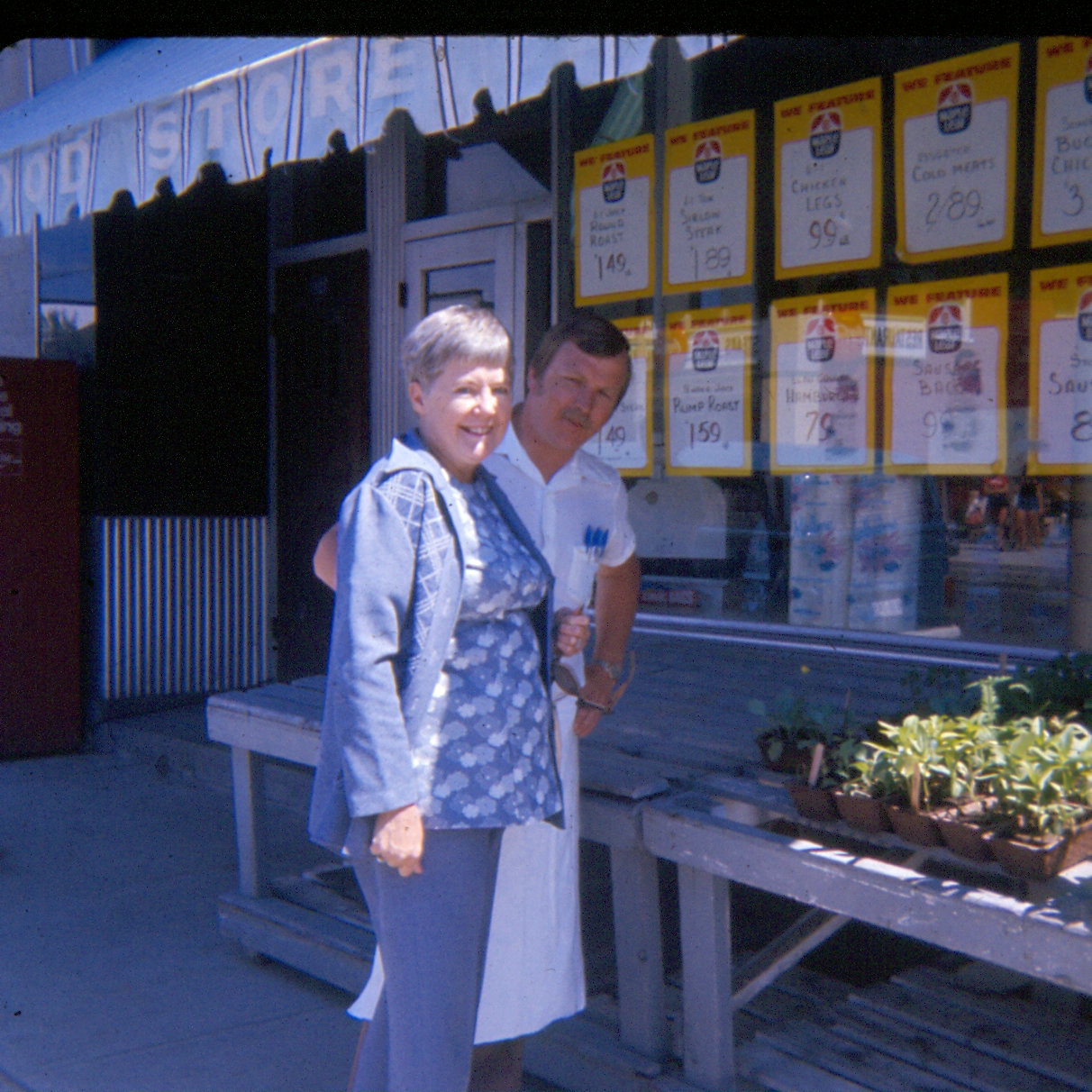 Sheridan Griffith with a customer in 1977