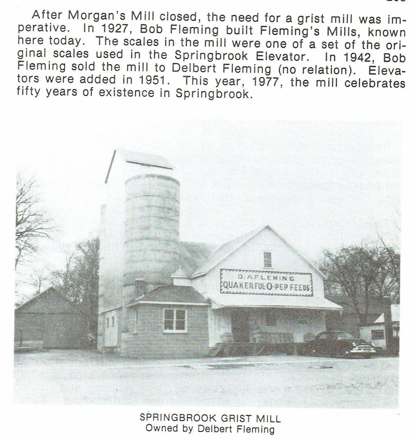 excerpt from “A Backward Glance” (1977) This is now a vacant lot. McKeown’s garage building is visible to the right, and the brick blacksmith shop behind McKeowns.
