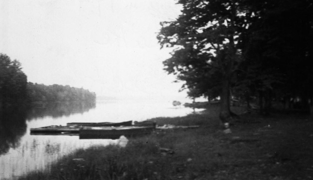 Boat docks on Crowe River at Belmont Lake
