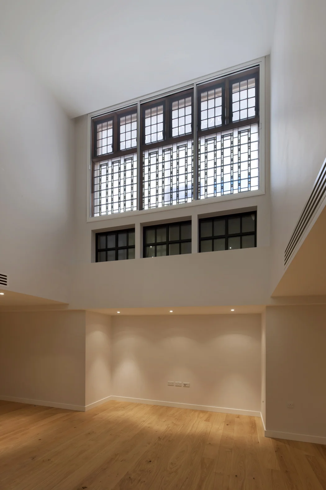  A view of the retained stained glass windows which are an original feature. 