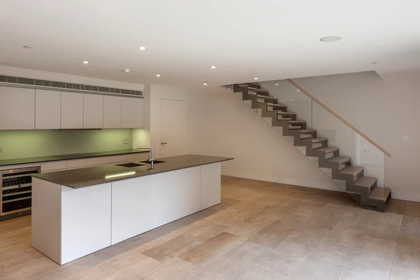  A honed limestone floor creates a calm sophisticated feel and is also practical in a main living space. 