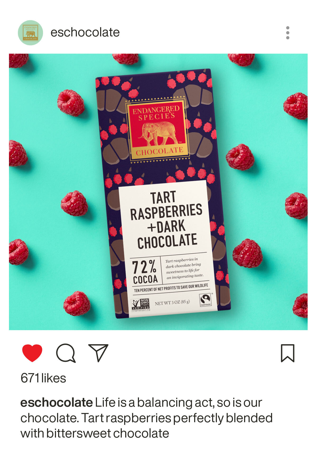 Instagram post of a 3D render of the redesigned 3oz dark chocolate Grizzly bar surrounded by raspberries on a teal background