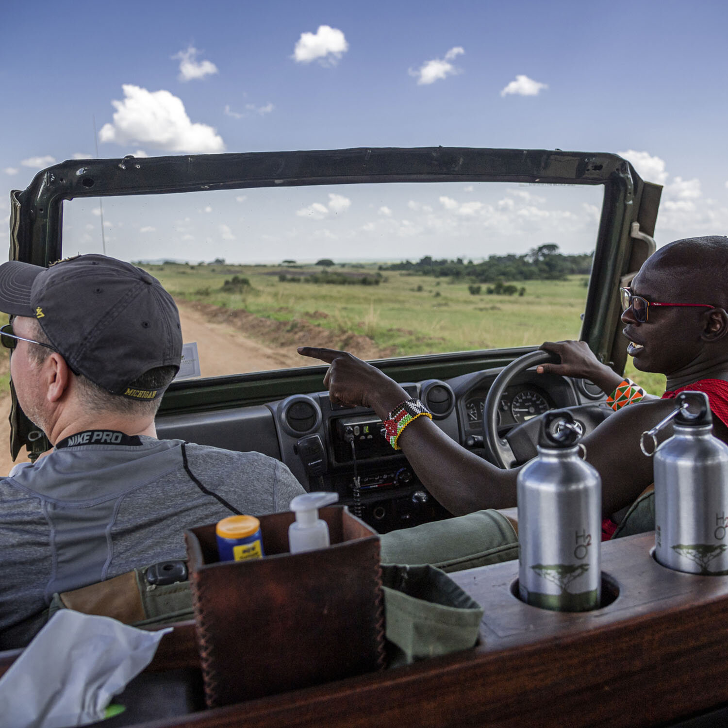 Tod Dalberg, ESC’s Director of Brand and Marketing, riding in a Jeep on a wildlife safari in the Masai Mara game reserve in Narok County, Kenya