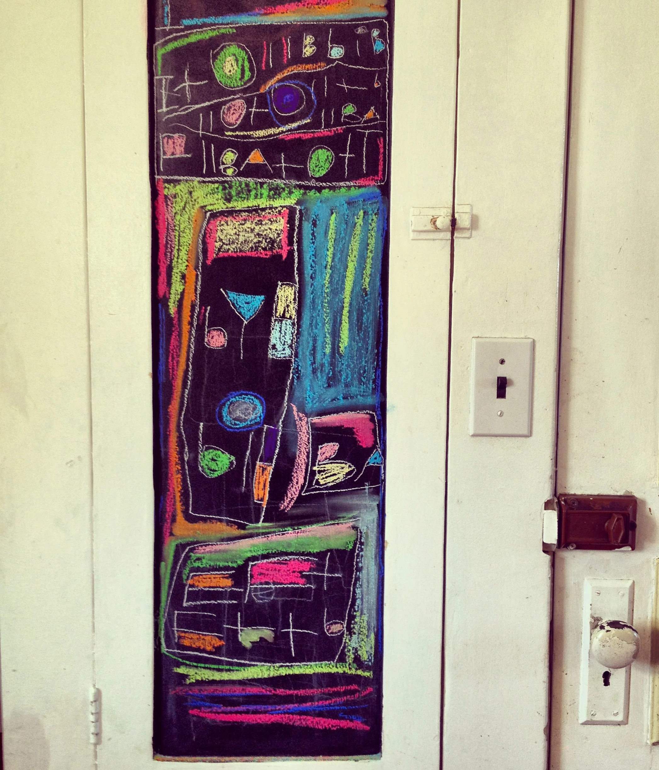 The spice cabinet, which we painted with chalkboard paint.