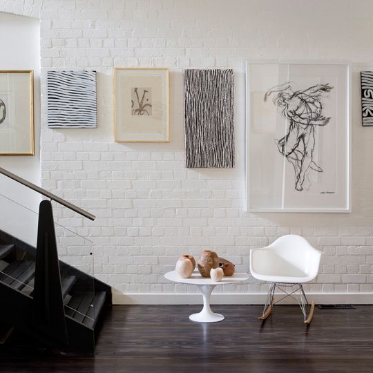 desiretoinspire.net LEVEL GALLERY- stagger art work at eye height, each level with the other. 