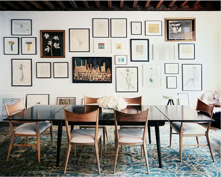 dreamsandjeans.com FULL GALLERY WALL- stagger art across the entire span of a wall from top to bottom and wall to wall. 