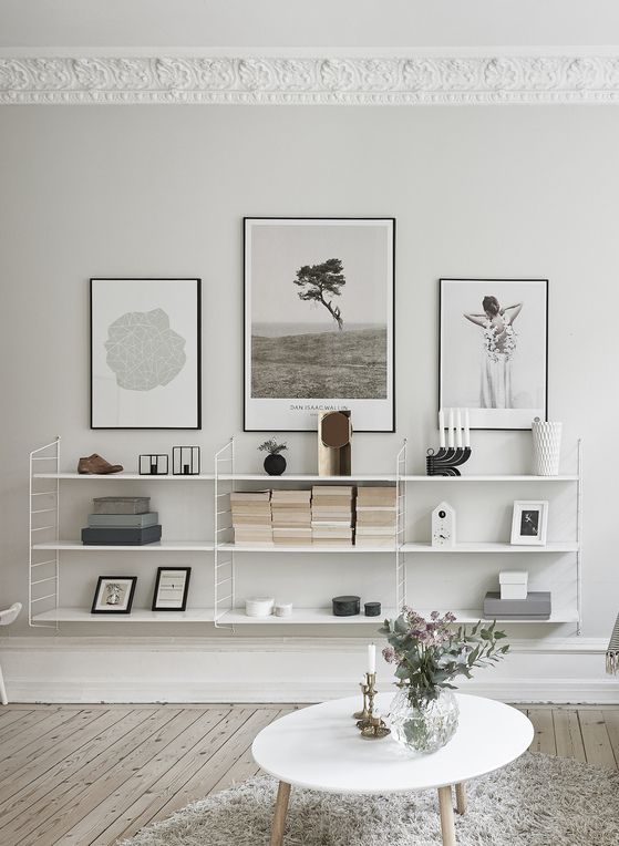 cocolapinedesign.com ODD NUMBERS- as a rule of thumb, things in odd numbers are always more interesting. Three pictures could be hung asymmetrically or symmetrically (as shown above). 