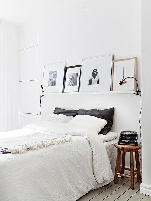 cjwho.com SINGLE SHELF LEANING GALLERY- a single shelf with a small gallery works well over a bed or alongside a dining room table. 
