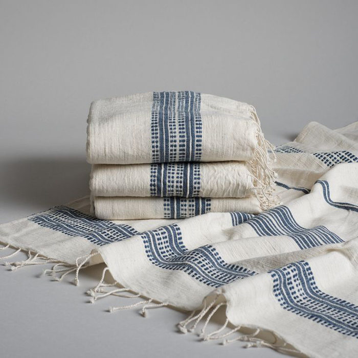 A collection of handmade fair-trade Ethiopian cotton bath sheets . 
