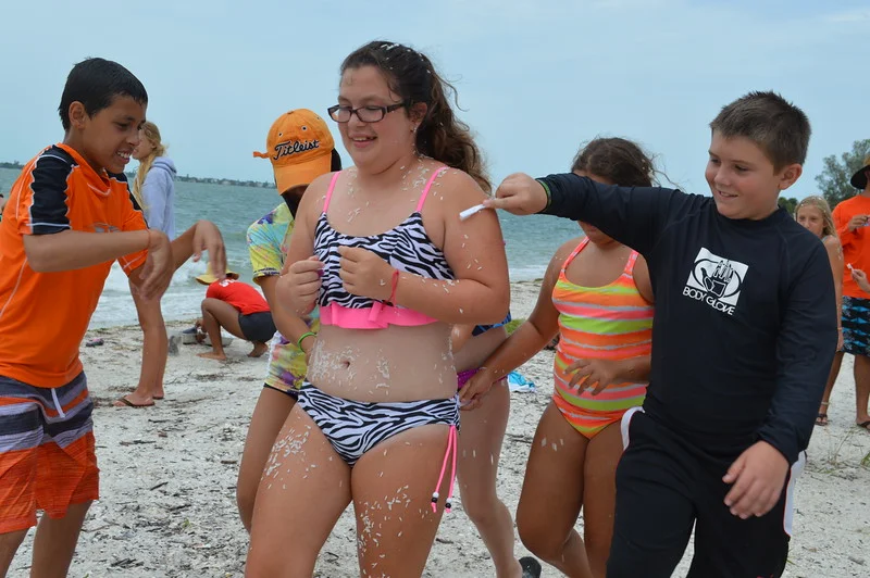 Sanibel Sea School campers pretend to be cleaner shrimp at Buttonwood Beach. 