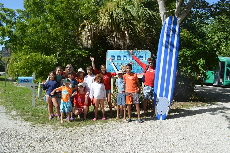 Goliath grouper week campers prepare for the weekly surf paddling competition. 