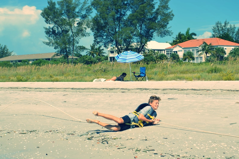 Camper Jaime Gustafson runs through an obstacle course to better understand the many challenges faced by male seahorses. 