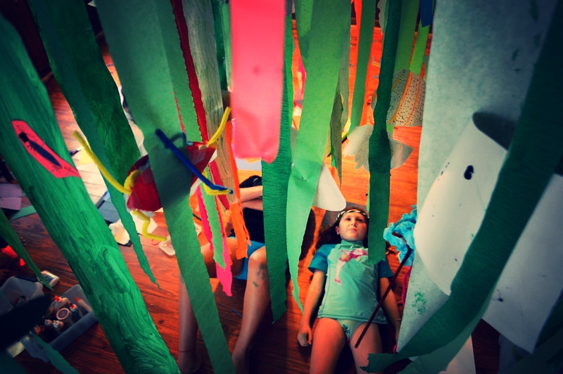 Pippa Valenti admires the giant, upside-down seagrass forest campers created for their parents. 