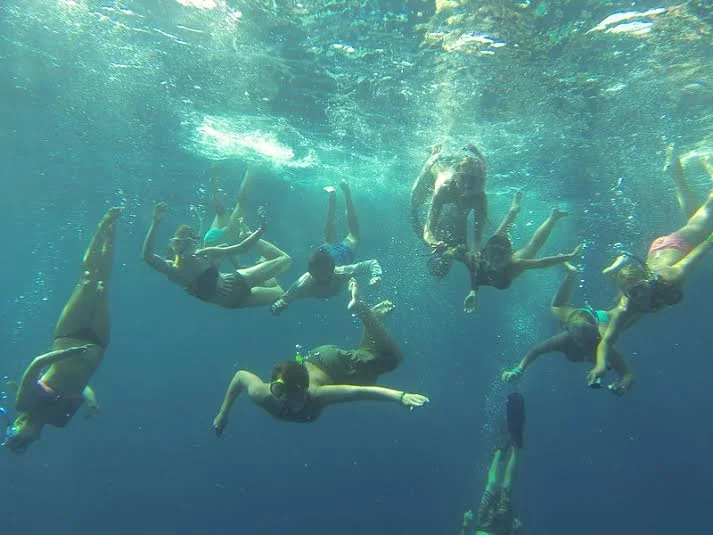 Nicole Finnicum : This is actually the background on my computer. It was the first time I took our teens to Andros Island in the Bahamas. We were trying to snap a photo while swimming in the Tongue of the Ocean, which is 6,000 feet deep. This trip was so memorable to me because I got to see lifelong SX3 campers fall deeply in love with the ocean in the place that I truly fell in love with the ocean - it was such a transformative experience for them and I was so happy to share the moment.