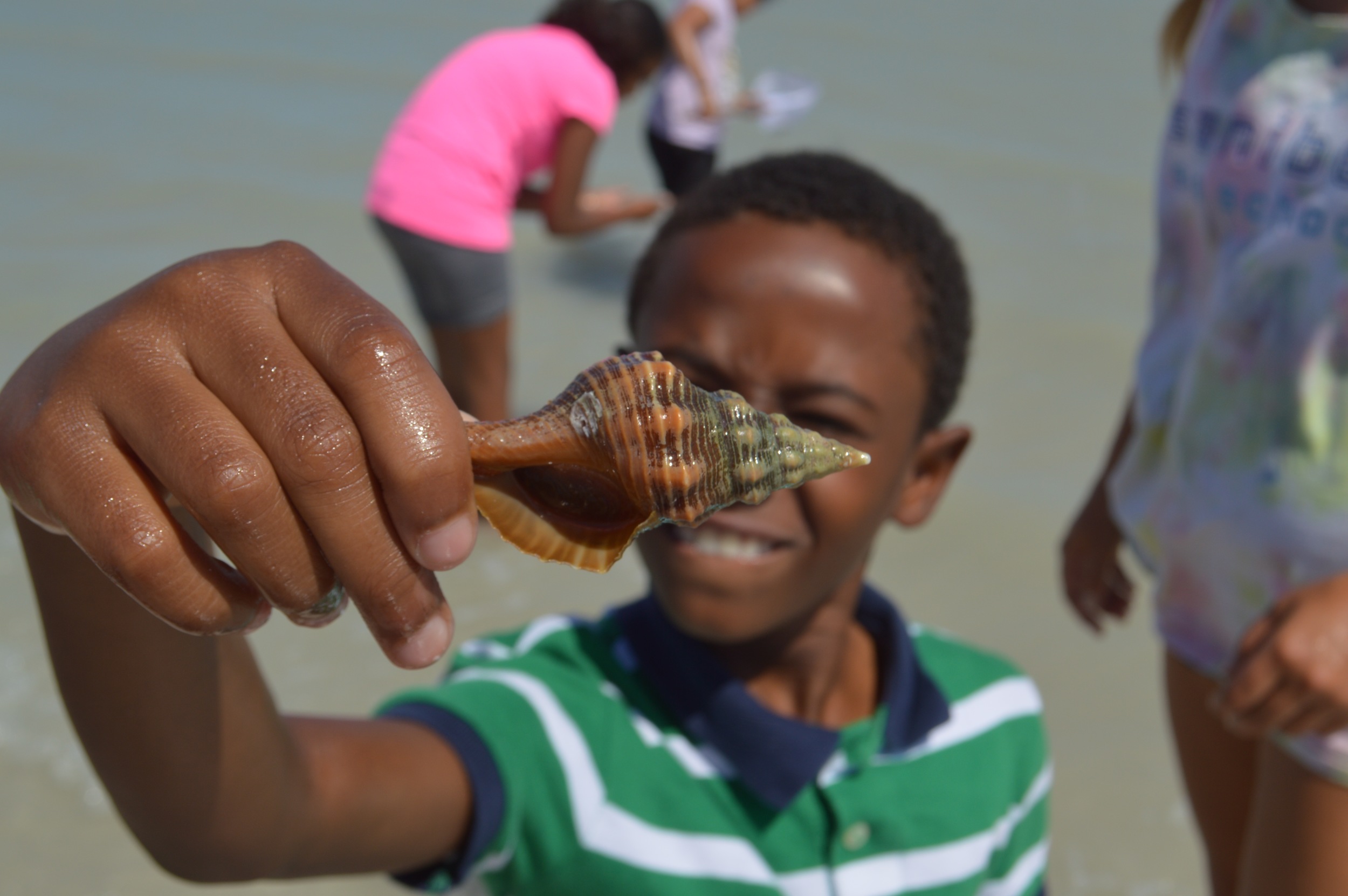 A student from the Heights Foundation, a Sanibel Sea School partner organization, explores the ocean during filming.