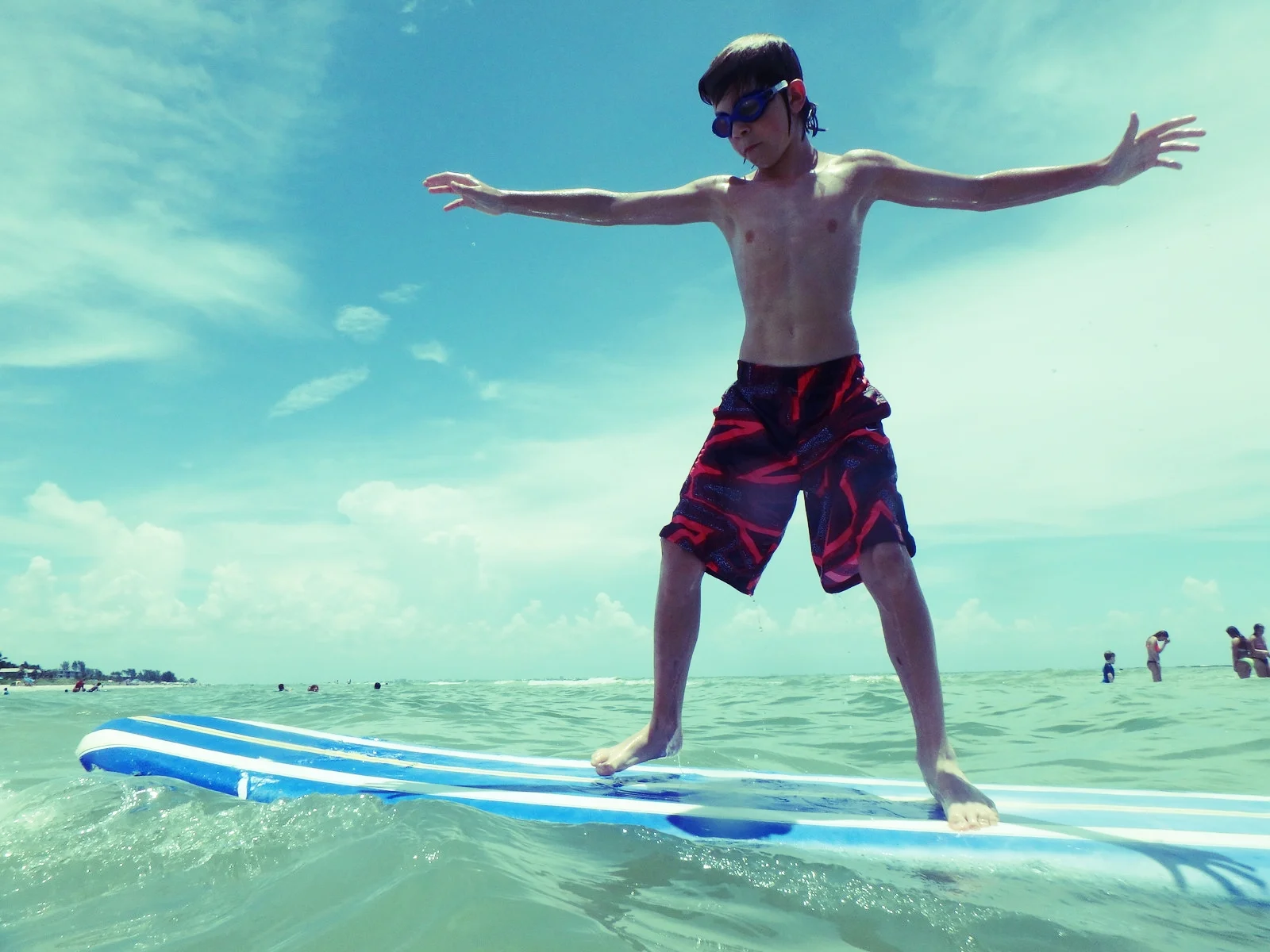 A camper practices surfing.