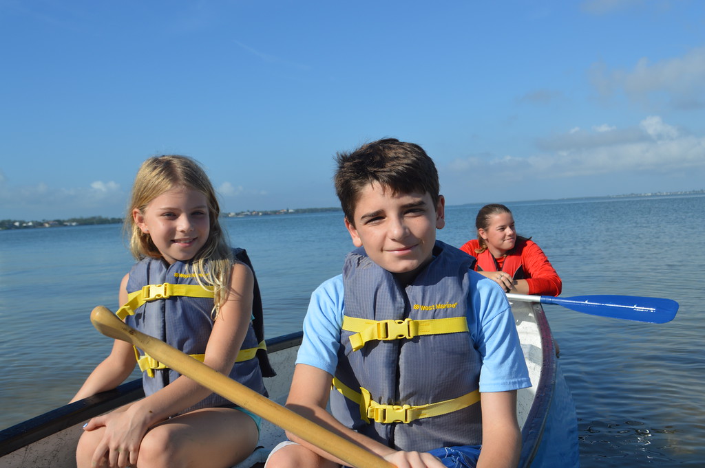 Campers paddled out to perform chants and songs for Sanibel's sharks. 