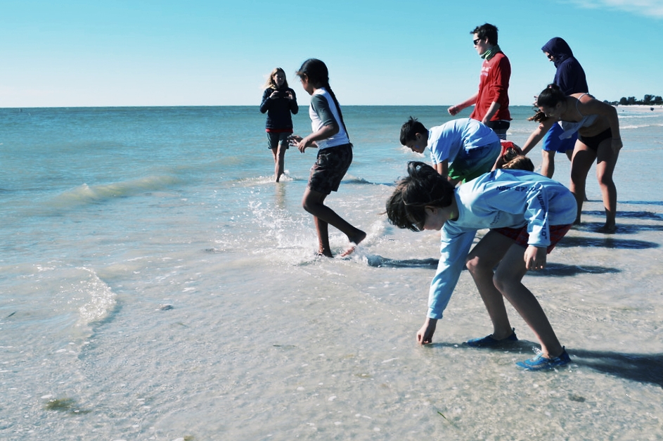 Campers give their worries to the sea during an annual Sanibel Sea School tradition. 